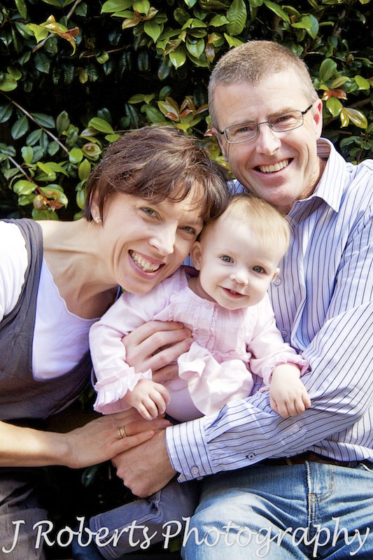 Little girl with her parents - family portrait photography sydney